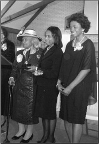 Left: Mr. Edrick Williams accepting his award. Right: Mrs. Dorothy Harper accepting her award.