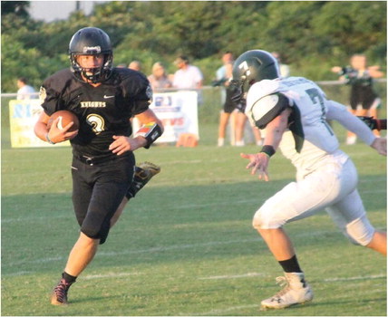 Matthew Baker (3) handles a carry in West Memphis Christian’s season opener.