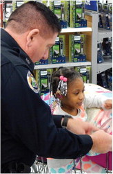 ‘Shop with a Cop’ event warms hearts, spreads cheer