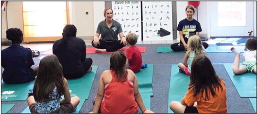 County Extension program brings ‘Yoga for Kids’ to Marion Library