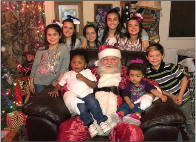 Saline County couple adopts seven siblings