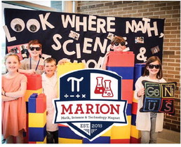 Marion holding Magnet  Application Day